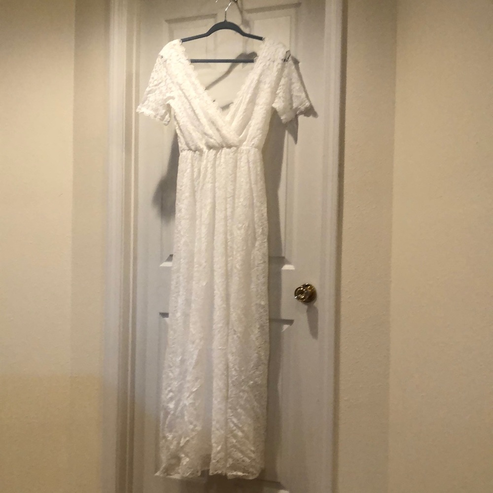 Full length, white lace, short sleeve dress.